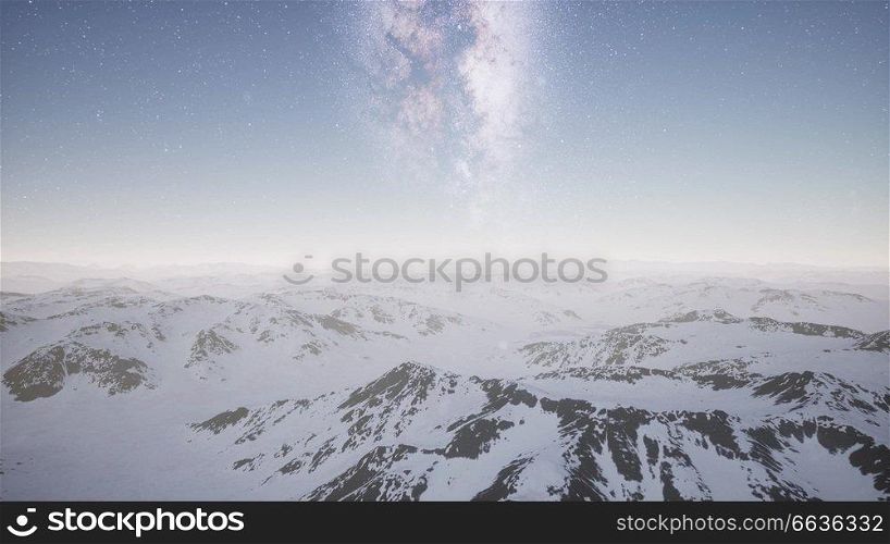 aerial view of Milky Way above snow covered terrain