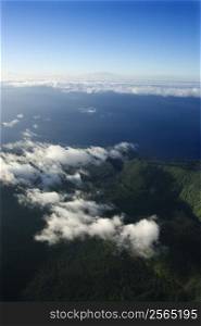 Aerial view of mountain landscape with clouds on Maui, Hawaii.