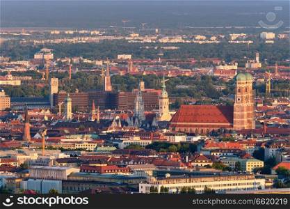 Aerial view of Munich center from Olympiaturm (Olympic Tower) on sunset. Munich, Bavaria, Germany. Aerial view of Munich. Munich, Bavaria, Germany