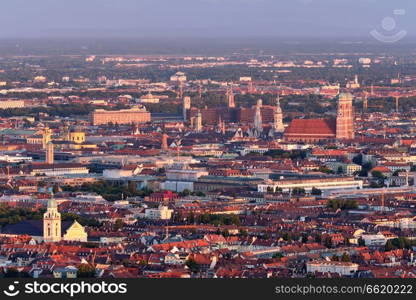 Aerial view of Munich center from Olympiaturm (Olympic Tower) on sunset. Munich, Bavaria, Germany. Aerial view of Munich. Munich, Bavaria, Germany