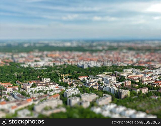 Aerial view of Munich from Olympiaturm Olympic Tower with tilt shift toy effect shallow depth of field. Munich, Bavaria, Germany
