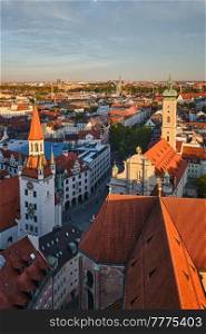 Aerial view of Munich - Marienplatz and Altes Rathaus from St. Peter&rsquo;s church on sunset. Munich, Germany. Aerial view of Munich