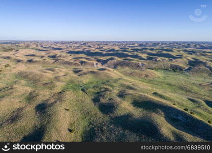 aerial view of Nebraska Sand Hills near Thedford, spring scenery with morning light