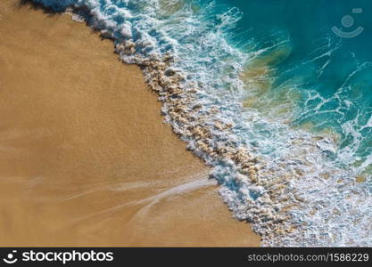 Aerial view of Ocean wave and Kelingking Beach in Nusa Penida island, Bali in Indonesia.