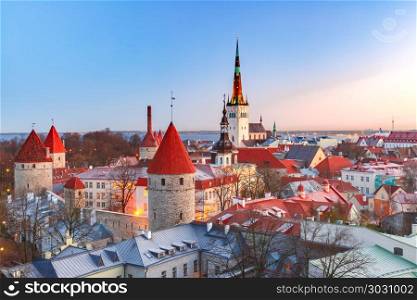 Aerial view of old town in Tallinn, Estonia. Aerial cityscape with Medieval Old Town, St. Olaf Baptist Church and Tallinn City Wall in the morning, Tallinn, Estonia