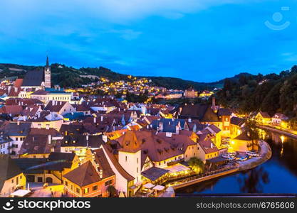 Aerial view of old Town of Cesky Krumlov, Czech Republic at dusk