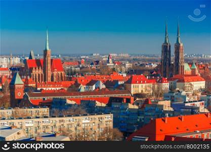 Aerial view of Ostrow Tumski with Cathedral of St. John and church of the Holy Cross and St. Bartholomew from St. Mary Magdalene Church in the morning in Wroclaw, Poland