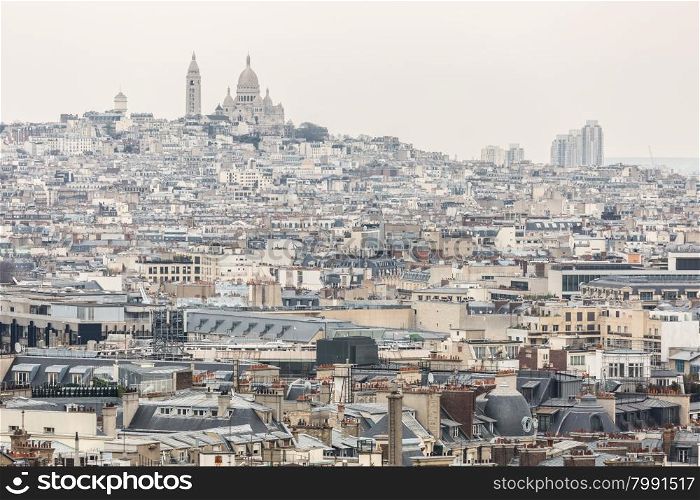 Aerial View of Paris cityscape and Sacre Coeur Cathedral on Montmartre