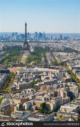 Aerial view of Paris skyline with Eiffel Tower, Les Invalides and business district of Defense, as seen from Montparnasse Tower, Paris, France
