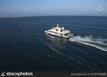 Aerial view of passenger ferry boat in open water near Bald Head Island, North Carolina.