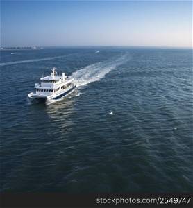 Aerial view of passenger ferry boat in open waters near Bald Head Island, North Carolina.