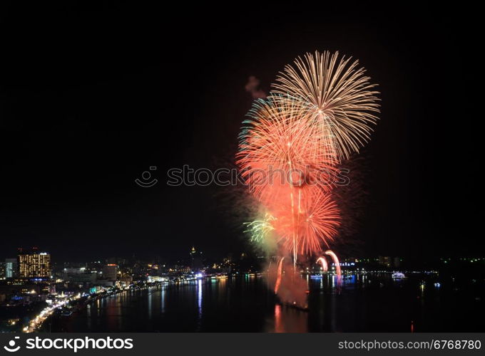 Aerial view of Pattaya city with firework at beach, Thailand