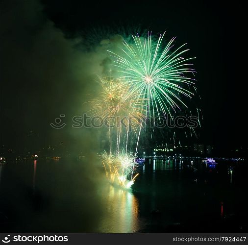 Aerial view of Pattaya city with firework at beach, Thailand