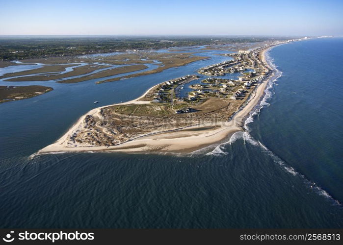 Aerial view of peninsula with beach and buildings in Murrells Inlet, South Carolina.