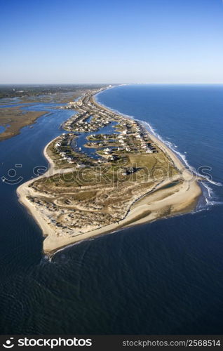 Aerial view of peninsula with beach and buildings in Murrells Inlet, South Carolina.