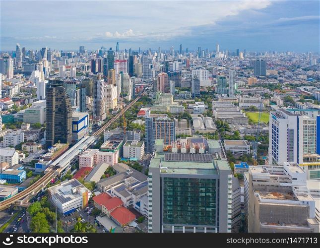 Aerial view of Phaya Thai district, Bangkok Downtown Skyline. Thailand. Financial district and business centers in smart urban city in Asia. Skyscraper and high-rise buildings at sunset.