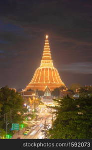 Aerial view of Phra Pathom Chedi stupa temple in Nakhon Pathom near Bangkok City, Thailand. Tourist attraction. Thai landmark architecture. Golden pagoda at night.