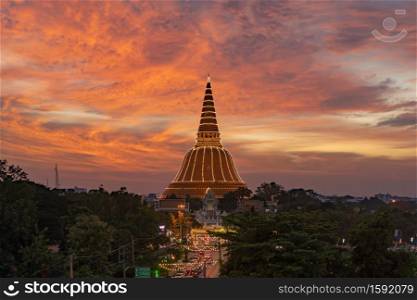 Aerial view of Phra Pathom Chedi stupa temple in Nakhon Pathom near Bangkok City, Thailand. Tourist attraction. Thai landmark architecture. Golden pagoda at sunset.
