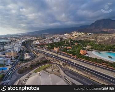 Aerial view of Playa de Las Americas cityscape in Tenerife from drone.