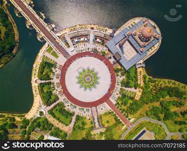 Aerial view of Putra mosque with garden landscape design and Putrajaya Lake, Putrajaya. The most famous tourist attraction in Kuala Lumpur City, Malaysia