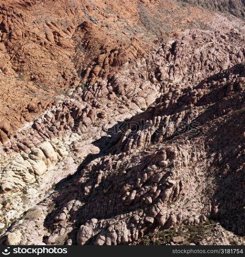 Aerial view of red rock cliffs in southwest.