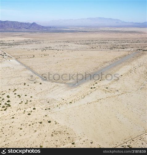 Aerial view of remote landing strip in California desert.