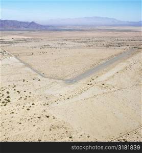 Aerial view of remote landing strip in California desert.