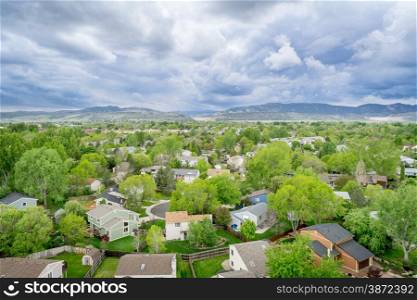 aerial view of resdential area and foothills of Rocky Mountains at springtime - Fort Collins, Colorado