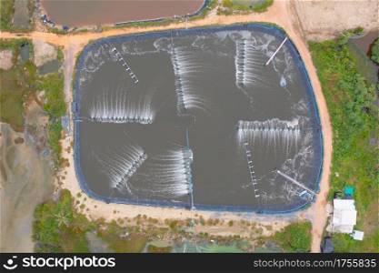 Aerial view of reservoir dam and water in recycle energy industry concept for electricity in Natural landscape background. Environment.