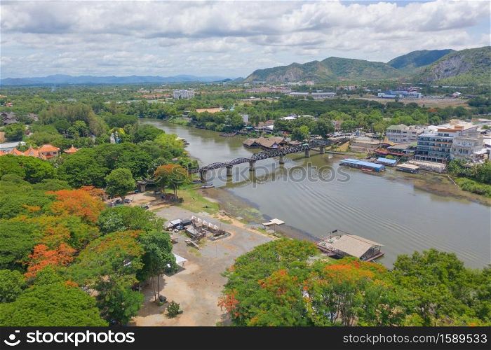 Aerial view of River Kwai Bridge with train rail way with Chao Phraya River, Tha Ma Kham, Mueang Kanchanaburi District, Thailand.