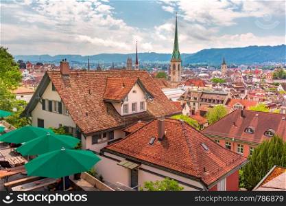 Aerial view of roofs and church towers in Old Town of Zurich, the largest city in Switzerland. Zurich, the largest city in Switzerland