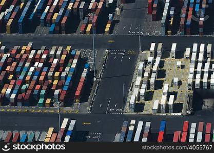 Aerial view of rows multi colored stacked cargo containers, Port Melbourne, Melbourne, Victoria, Australia