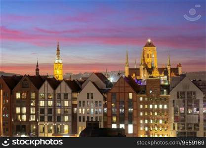 Aerial view of Saint Mary Church and Town Hall at sunset in Old Town of Gdansk, Poland. St Mary Church at sunset in Gdansk, Poland