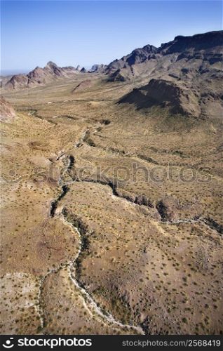 Aerial view of southwestern landscape with mountains.