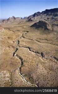 Aerial view of southwestern landscape with mountains.