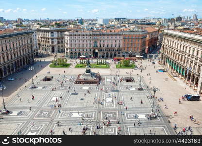 Aerial view of square from roof of famous Cathedral Duomo di Milano on piazza in Milan, Italy