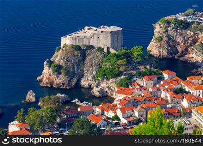 Aerial view of St. Lawrence Fort in the medieval historical part of the city on a sunny morning. Dubrovnik. Croatia.. Dubrovnik. Fort St. Lawrence in the morning.