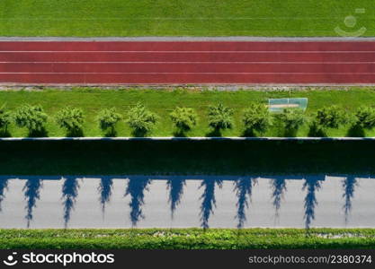 Aerial view of stadium side with running tracks, close up