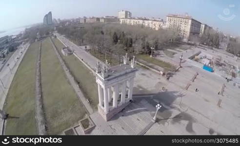 Aerial view of stairs and white stone colonnade on the embankment in Volgograd, Russia