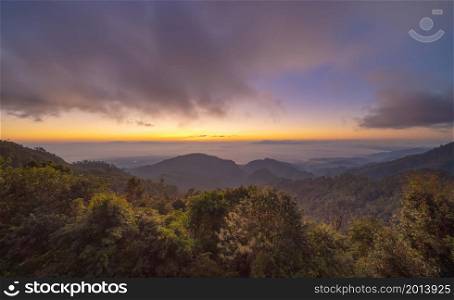 Aerial view of sunrise above fluffy sea fog misty clouds with mountain hill from Phu Tub Berk, Khao Kho, Phetchabun, Thailand with sunlight. Nature landscape background in sunset.