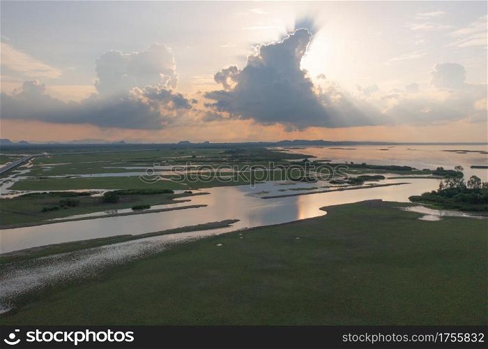 Aerial view of swamp or lagoon in Phang Nga Bay, lake, sea or river in national park and mountain or hill in Thailand. Natural landscape background.