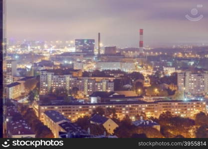 Aerial view of Tallinn from a skyscraper at night.. Tallinn at night from a height.