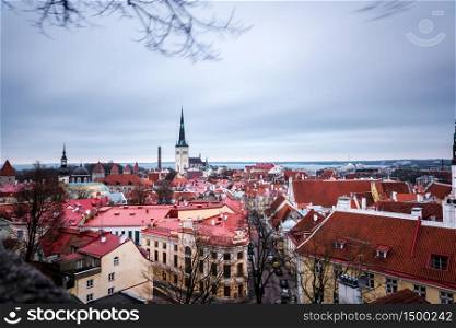 Aerial view of Tallinn&rsquo;s old town on a cold cloudy Autumn afternoon, with the Baltic sea in the background. Long exposure.