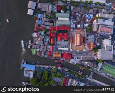 Aerial view of temple, Wat Devaraj Kunchorn Worawihan, Thai architectures. Close up of red roofs. Top view.