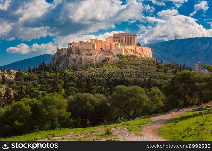 Aerial view of the Acropolis Hill, crowned with Parthenon at midnoon in Athens, Greece. Acropolis Hill and Parthenon in Athens, Greece