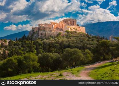 Aerial view of the Acropolis Hill, crowned with Parthenon at midnoon in Athens, Greece. Acropolis Hill and Parthenon in Athens, Greece