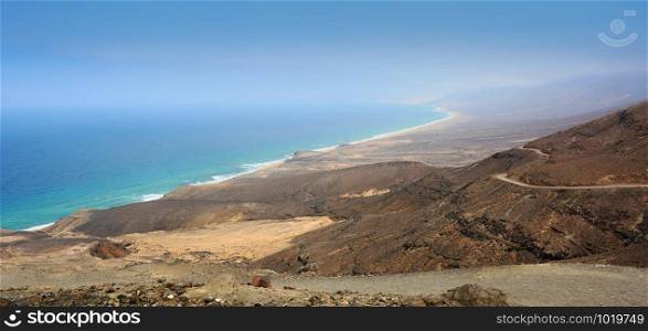 Aerial view of the beautiful long and wide Cofete beach on Fuerteventura island, Spain.