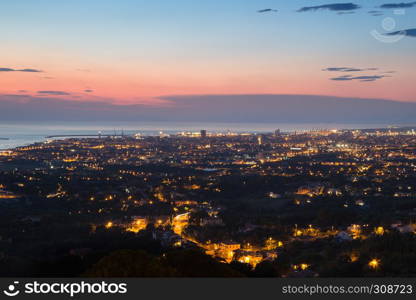 Aerial View of the city of Livorno in Tuscany at Dusk.. Aerial View of the city of Livorno in Tuscany at Dusk