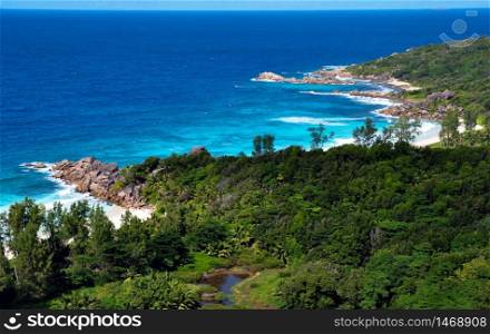 Aerial view of the coastline of Grand Anse and the Indian Ocean, La Digue Island, Seychelles