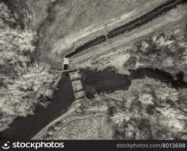 aerial view of the diversion dam providing water for farming - Cache la Poudre River at Fort Collins, Colorado